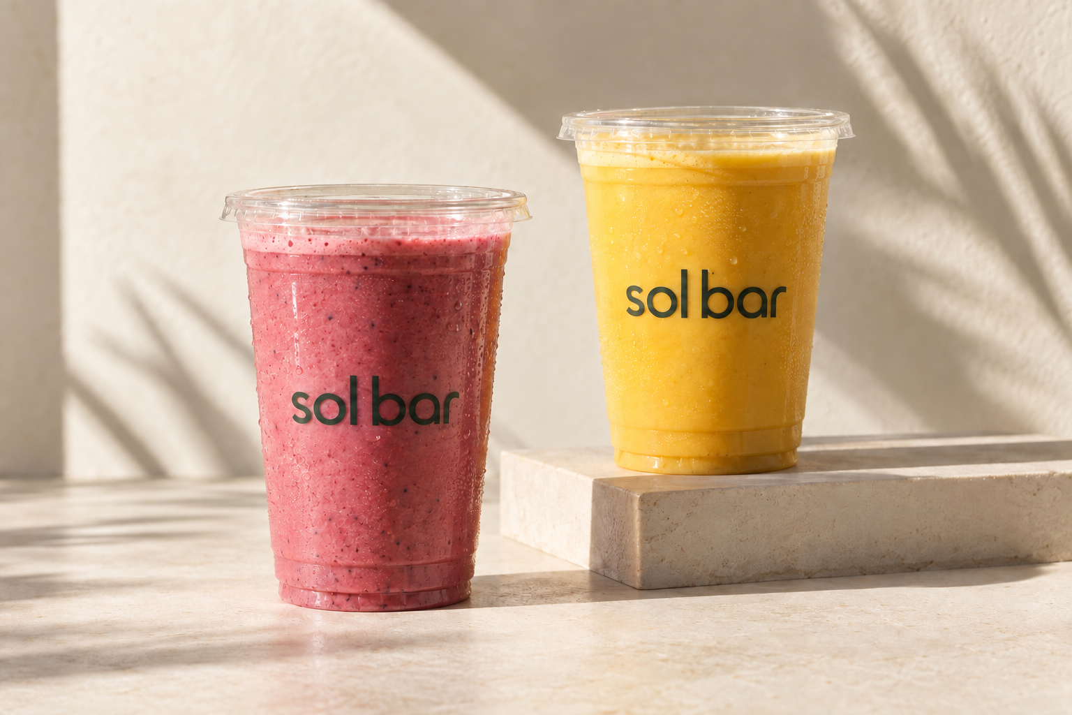 Sol Bar berry and mango smoothies in clear cups